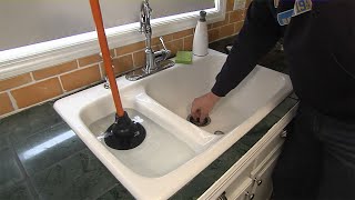 How to Fix a Clogged Drain [upl. by Lawlor190]