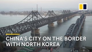 Dandong Chinas border city with North Korea [upl. by Aileme]